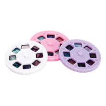 Load image into Gallery viewer, Three colorful film reels on a white background