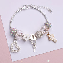 Load image into Gallery viewer, Lauren Hinkley Cross Charm Bracelet
