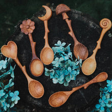 Load image into Gallery viewer, Wooden spoons on a dark surface with greenery