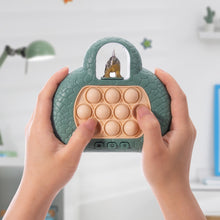 Load image into Gallery viewer, Jurassic Push & Pop Game Console **Damaged Box **