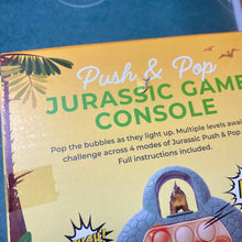 Load image into Gallery viewer, Jurassic Push &amp; Pop Game Console **Damaged Box **
