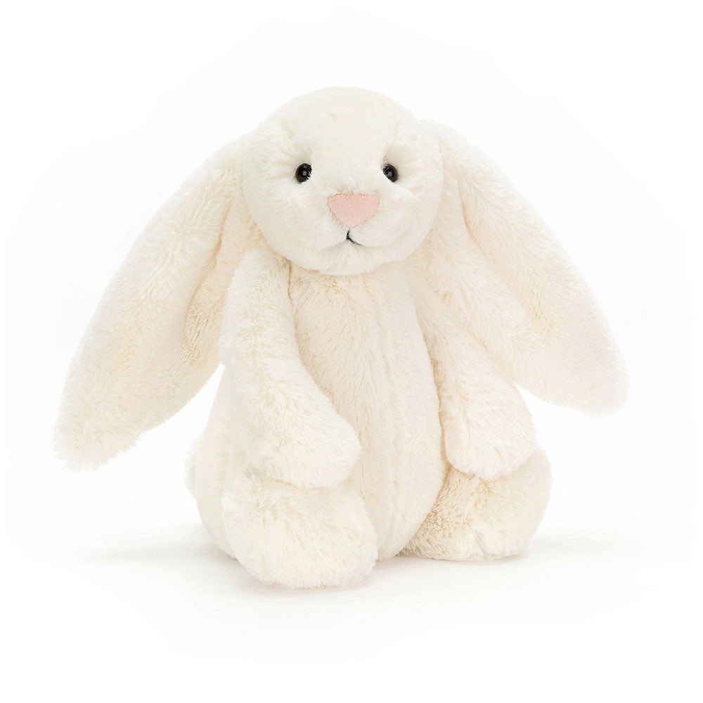 White plush bunny toy on a white background