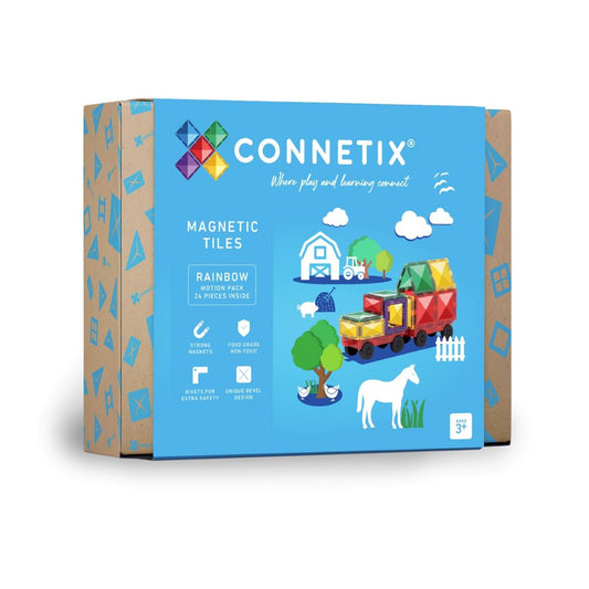 A box of Connetix magnetic tiles in various shapes including car bases with rubber wheels, small squares, rectangle pieces, door pieces, and an idea booklet, displayed against a blue background.