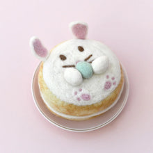 Load image into Gallery viewer, Donut with rabbit face decoration on a pink background
