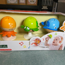 Load image into Gallery viewer, Hape Stay-Put Rattle Set ** Damaged Box **
