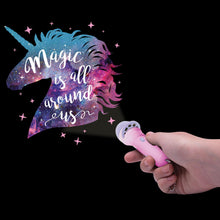 Load image into Gallery viewer, Hand holding a torch projecting a colorful unicorn design with 'Magic is all around us' text on a black background.
