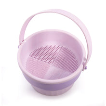 Load image into Gallery viewer, Purple silicone colander with handle on a white background
