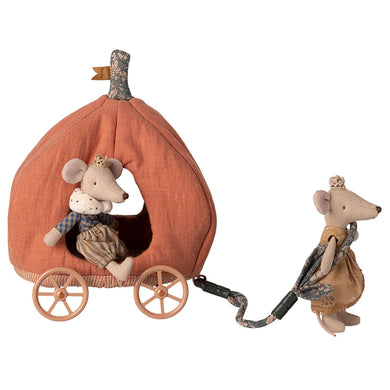 Decorative pumpkin with two mouse figures and a small flag on a white background.