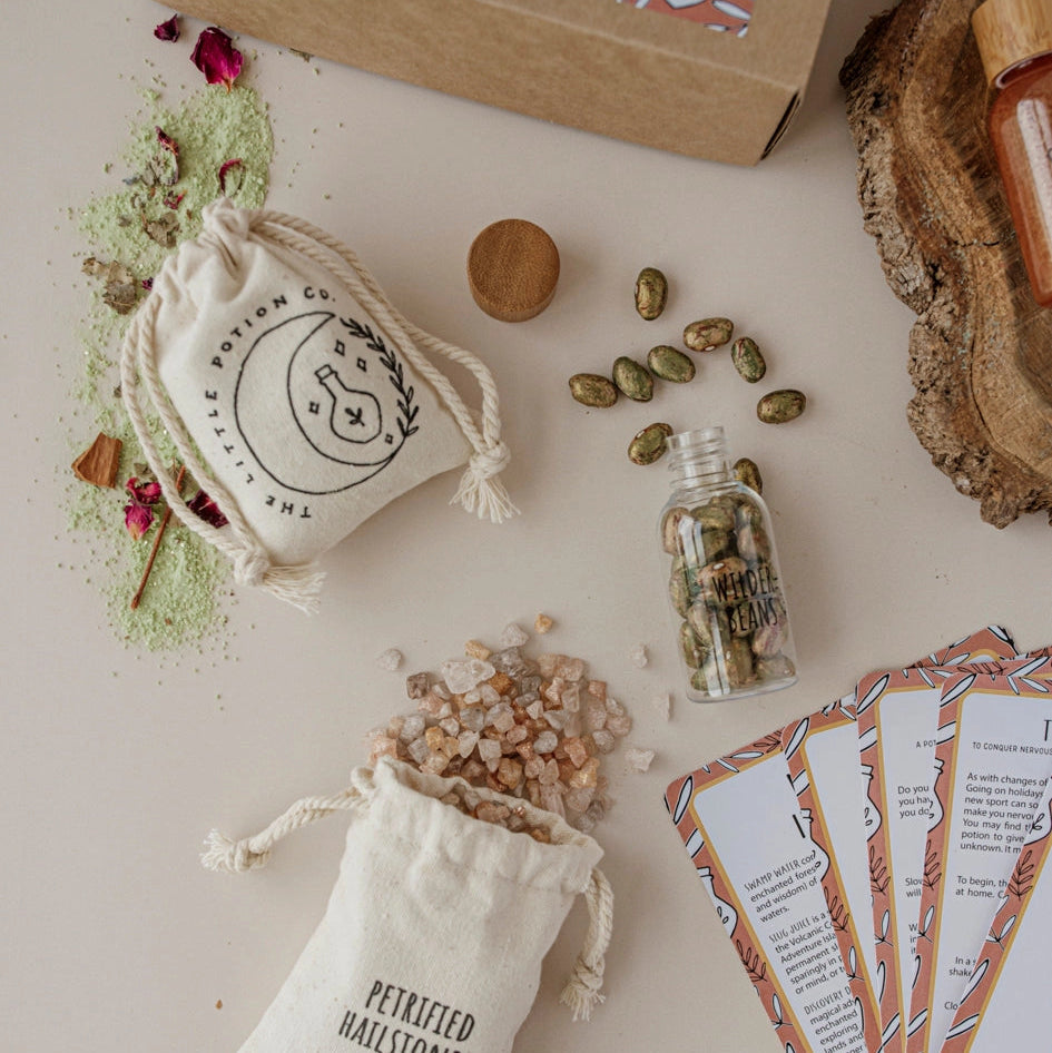 Spice and petrified wood stone set with packaging on a light surface